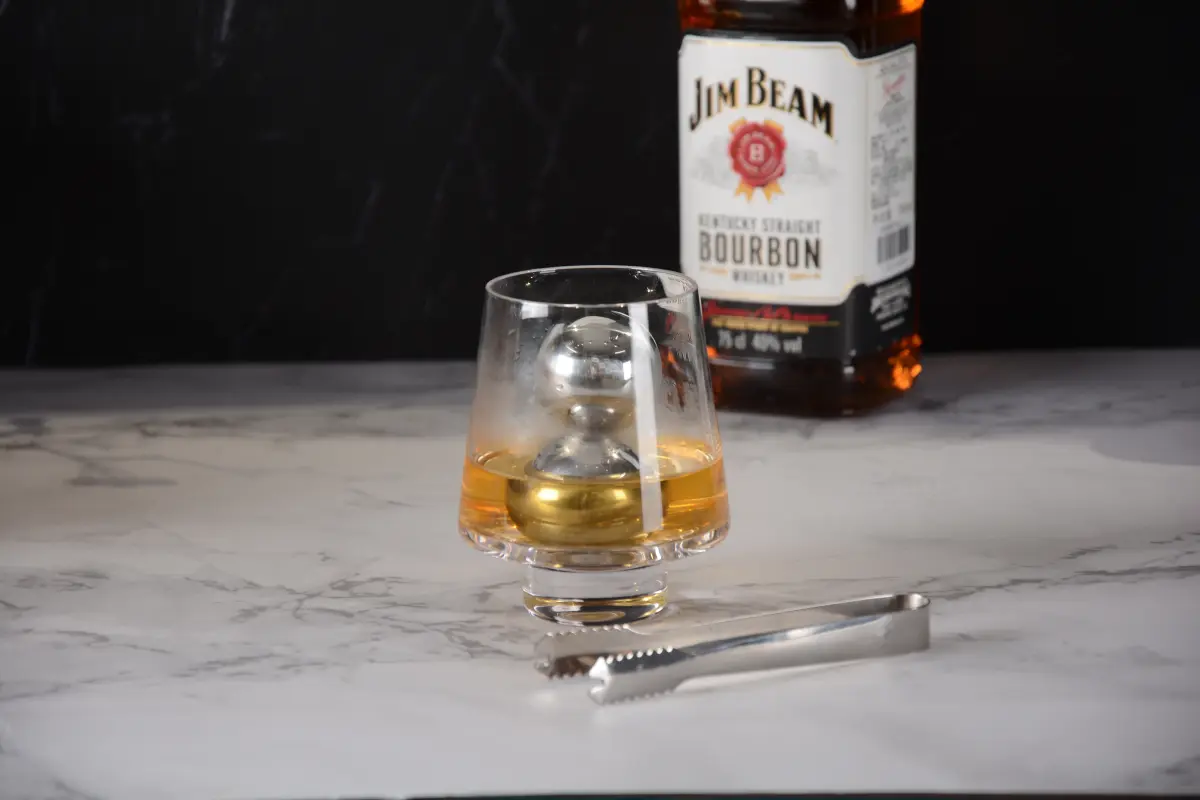 Luxury whiskey tumbler with stainless steel stone